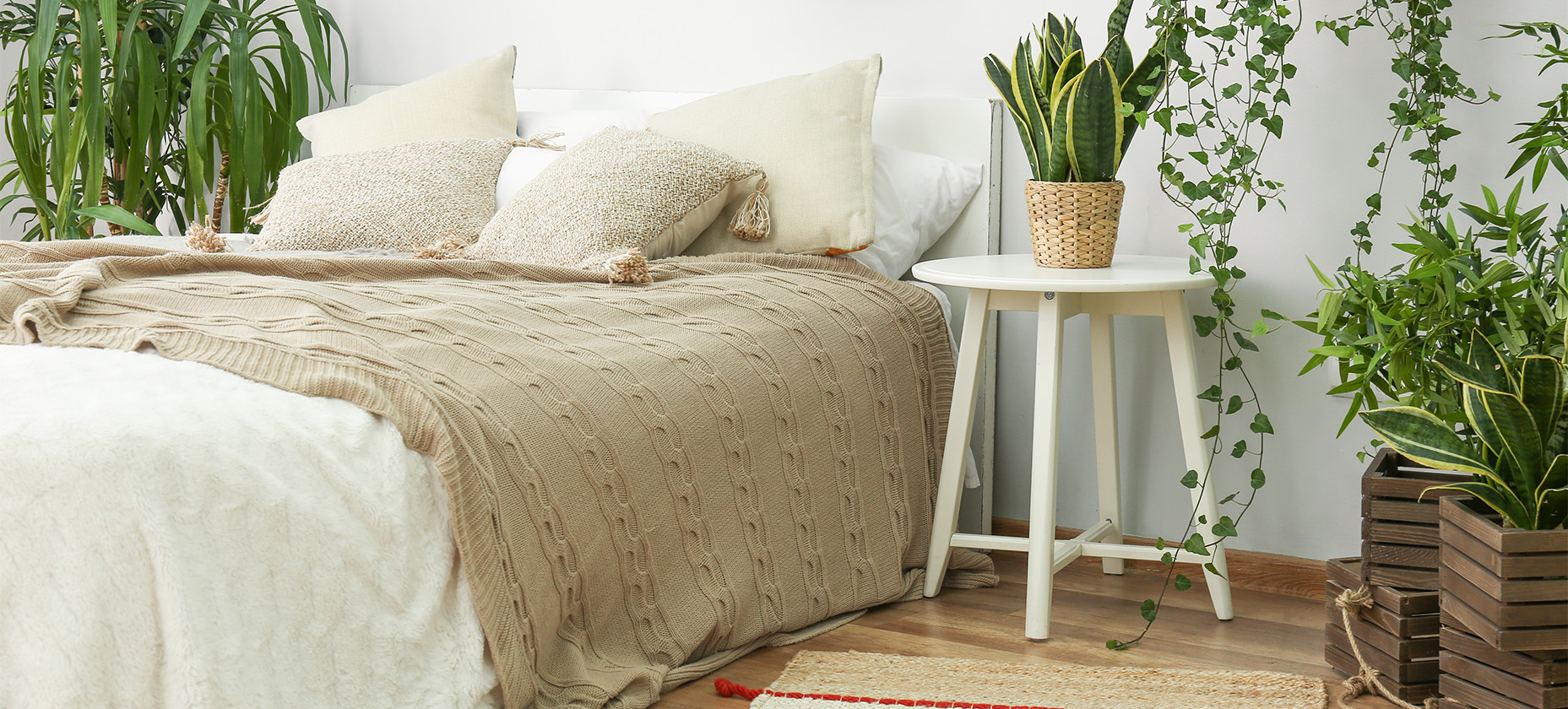 Bedroom with green houseplants