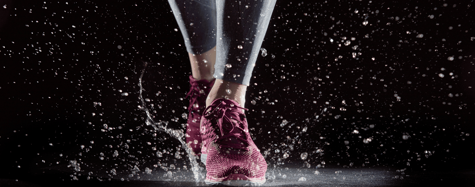 Sports shoes in water splash